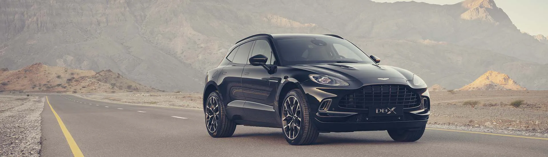 Aston Martin DBX 2022: straight-six teased before upcoming debut