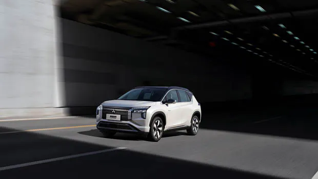 Mitsubishi Airtrek EV 2022 driving on road
