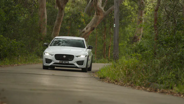 Jaguar XE P300 AWD Black 2022 front dynamic 2