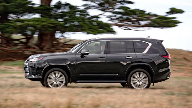 2022 Lexus LX600 SUV black - dynamic side profile shot