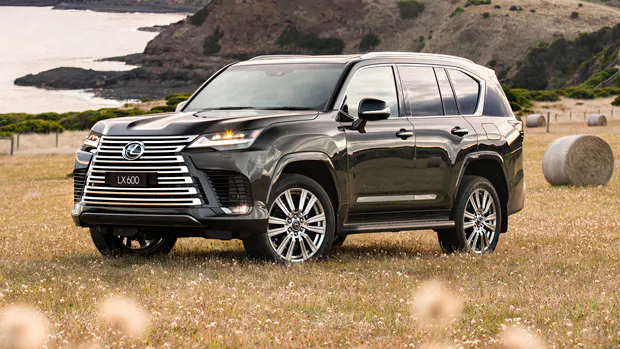 2022 Lexus LX600 SUV black - front 3/4 static shot #1