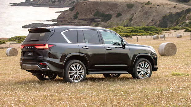 2022 Lexus LX600 SUV black - rear 3/4 static shot #1