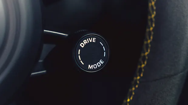 2022-Porsche-911-GTS-coupe-yellow---interior,-drive-mode-dial