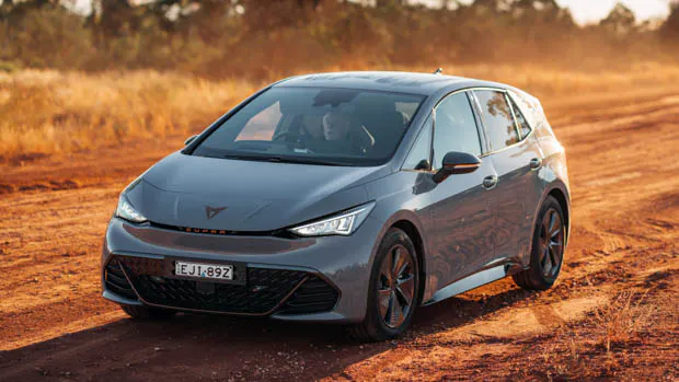 Cupra Born 2023 front 3/4 dirt road