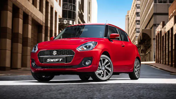 2020 Suzuki Swift front 3/4 shot red car