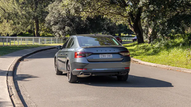 Skoda Superb 206TSI Sportline 2023 driving rear 3/4 4