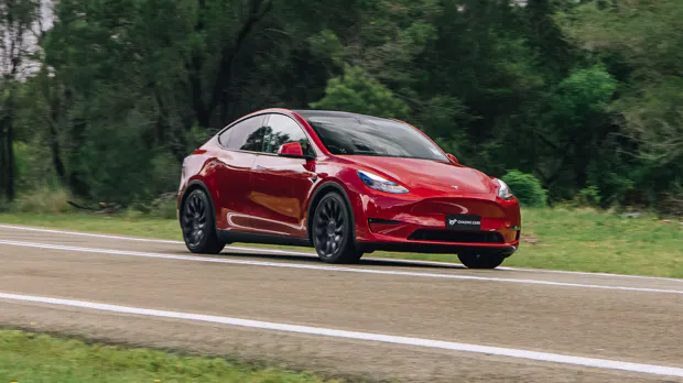 2023 Tesla Model Y Performance red side cornering
