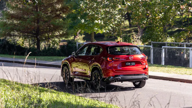 Mazda CX-5 GT SP Turbo 2023 driving rear foreground
