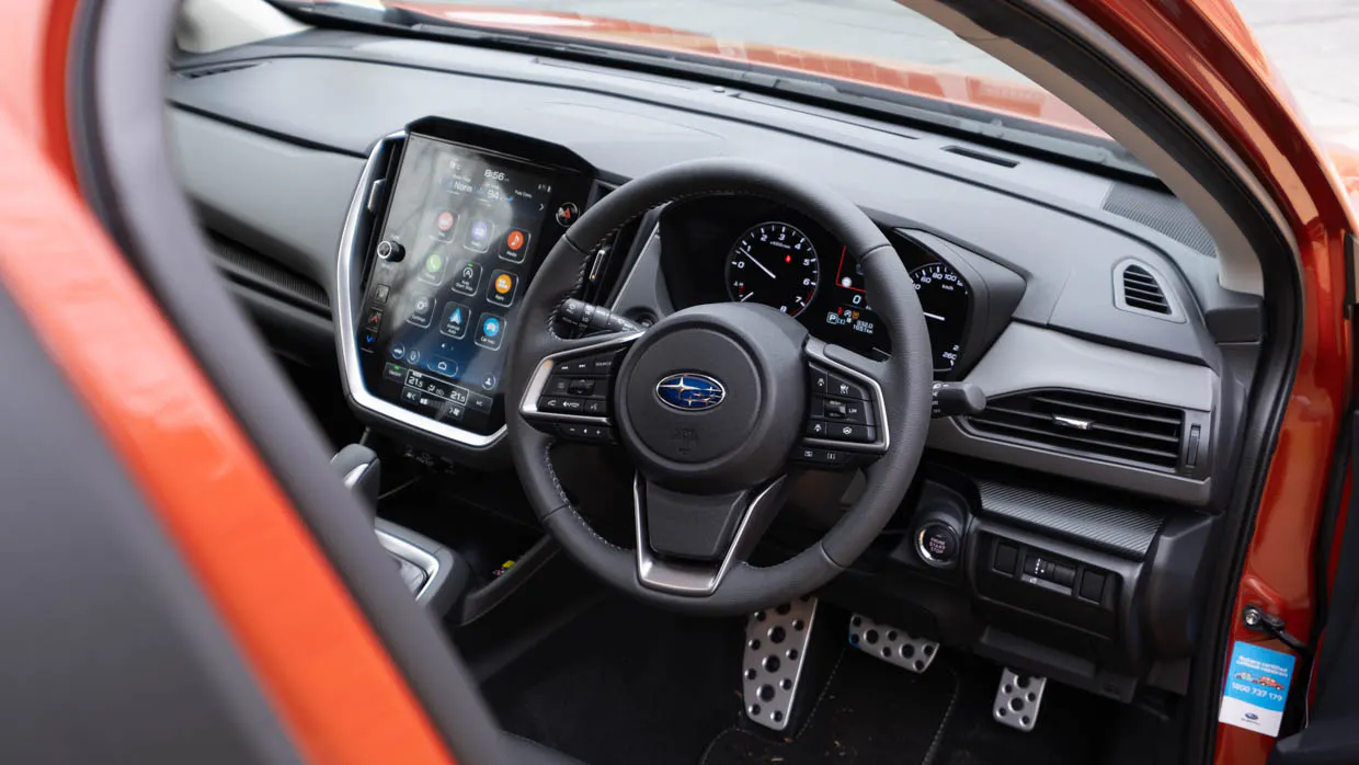 Subaru Crosstrek 2.0S interior shot of steering wheel and controls