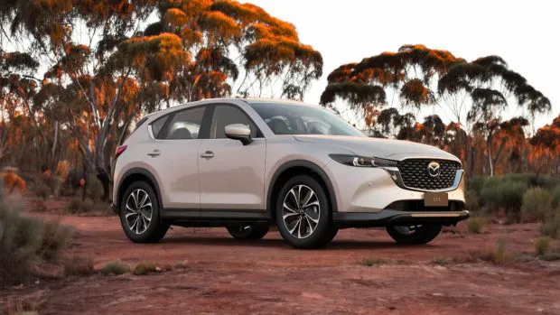 2024 Mazda CX-5 Touring white front 3/4