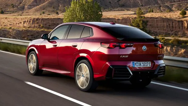 2024 BMW iX2 on road rear 3/4 angle
