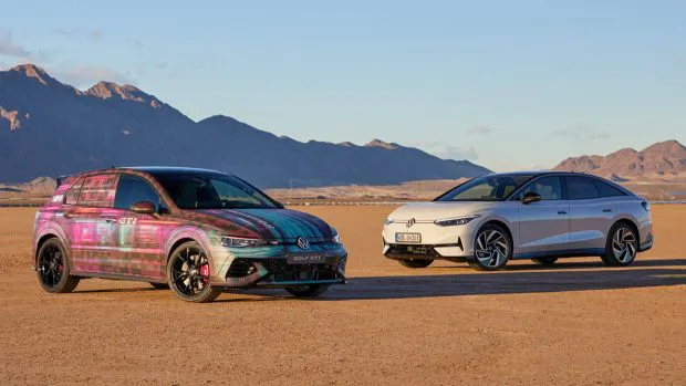2025 Volkswagen ID7 and Golf GTI front angle static with mountains