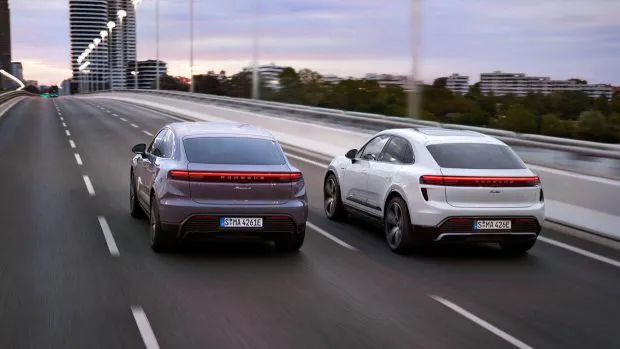 2024 Porsche Macan 4 and Turbo EV driving shot rear 3/4