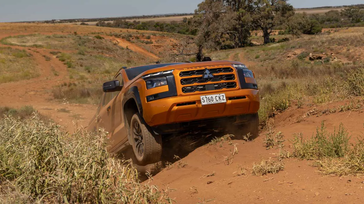 Mitsubishi Triton GSR 2024 driving front off road 2