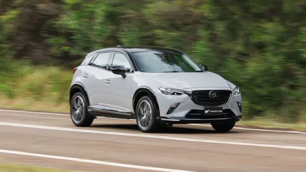 Mazda CX-3 Touring SP 2024 driving front 8