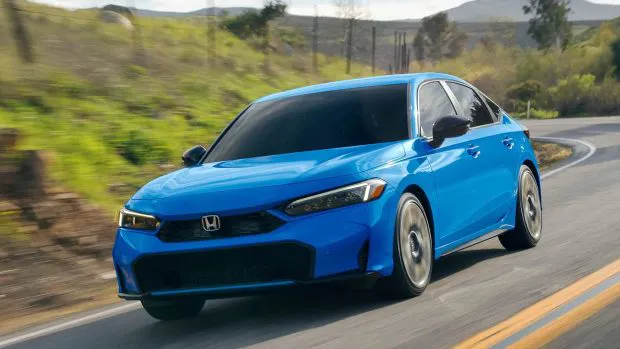 2025 Honda Civic blue front 3/4 driving shot