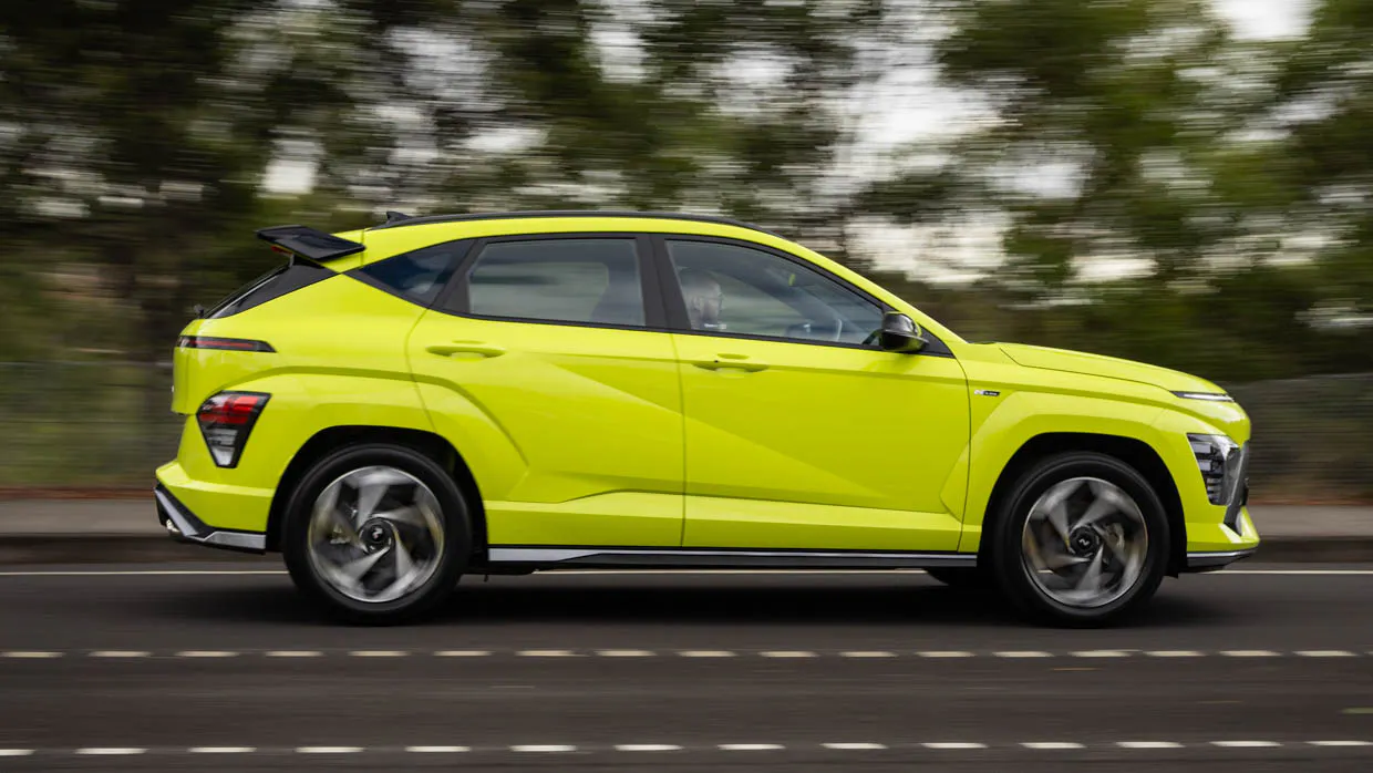 2024 Hyundai Kona Hybrid N-Line side angle passing driving shot