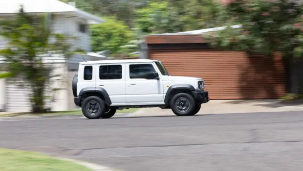 Suzuki Jimny XL 2024 driving street side