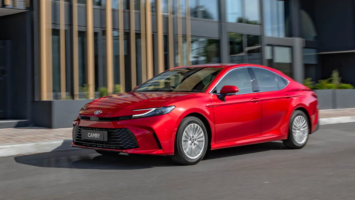 2024 Toyota Camry Ascent side angle driving shot