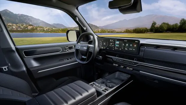 2025 Kia Tasman interior wide shot with steering wheel 2
