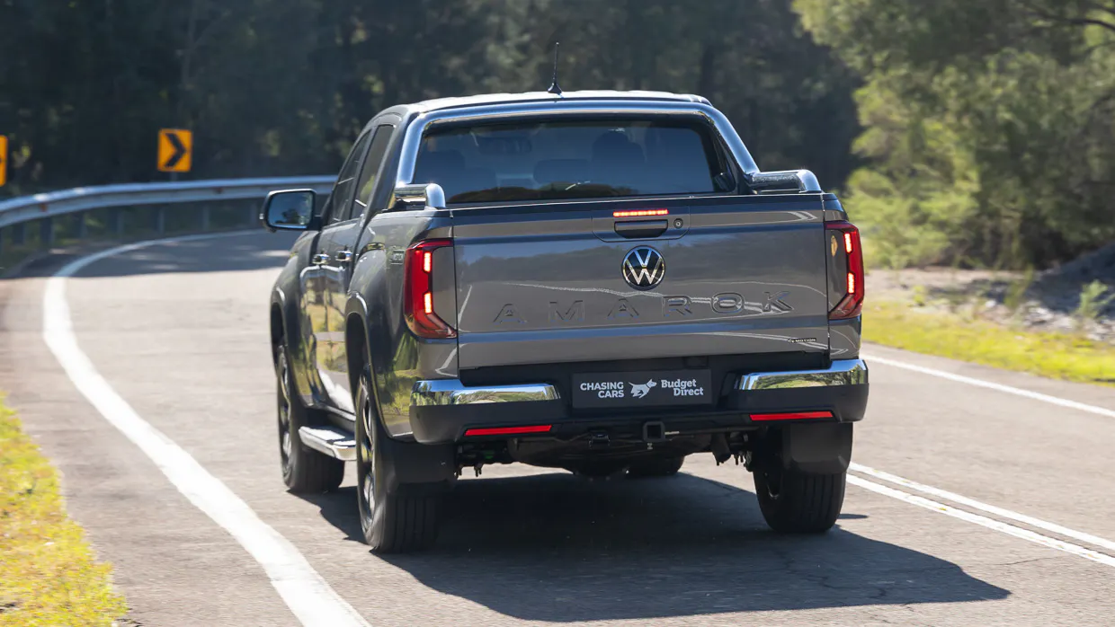 2024 Volkswagen Amarok Style TDI500 rear angle driving shot