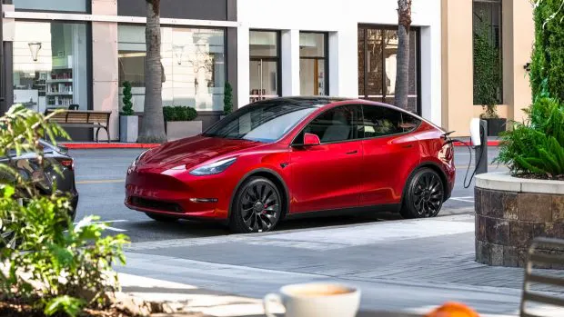 2024 Tesla Model Y red charging