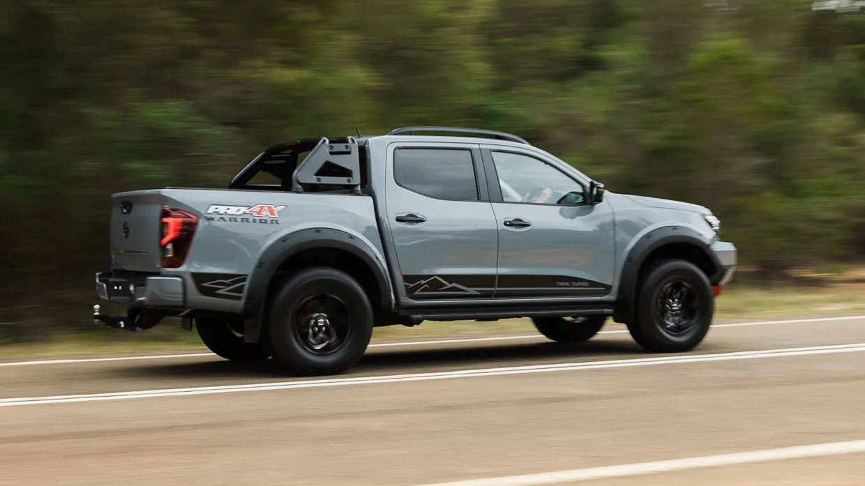 Nissan Navara Pro-4X Warrior 2025 driving rear 4